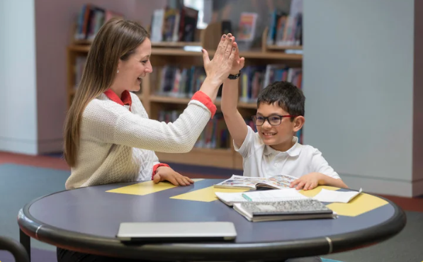 Tutor working with a student